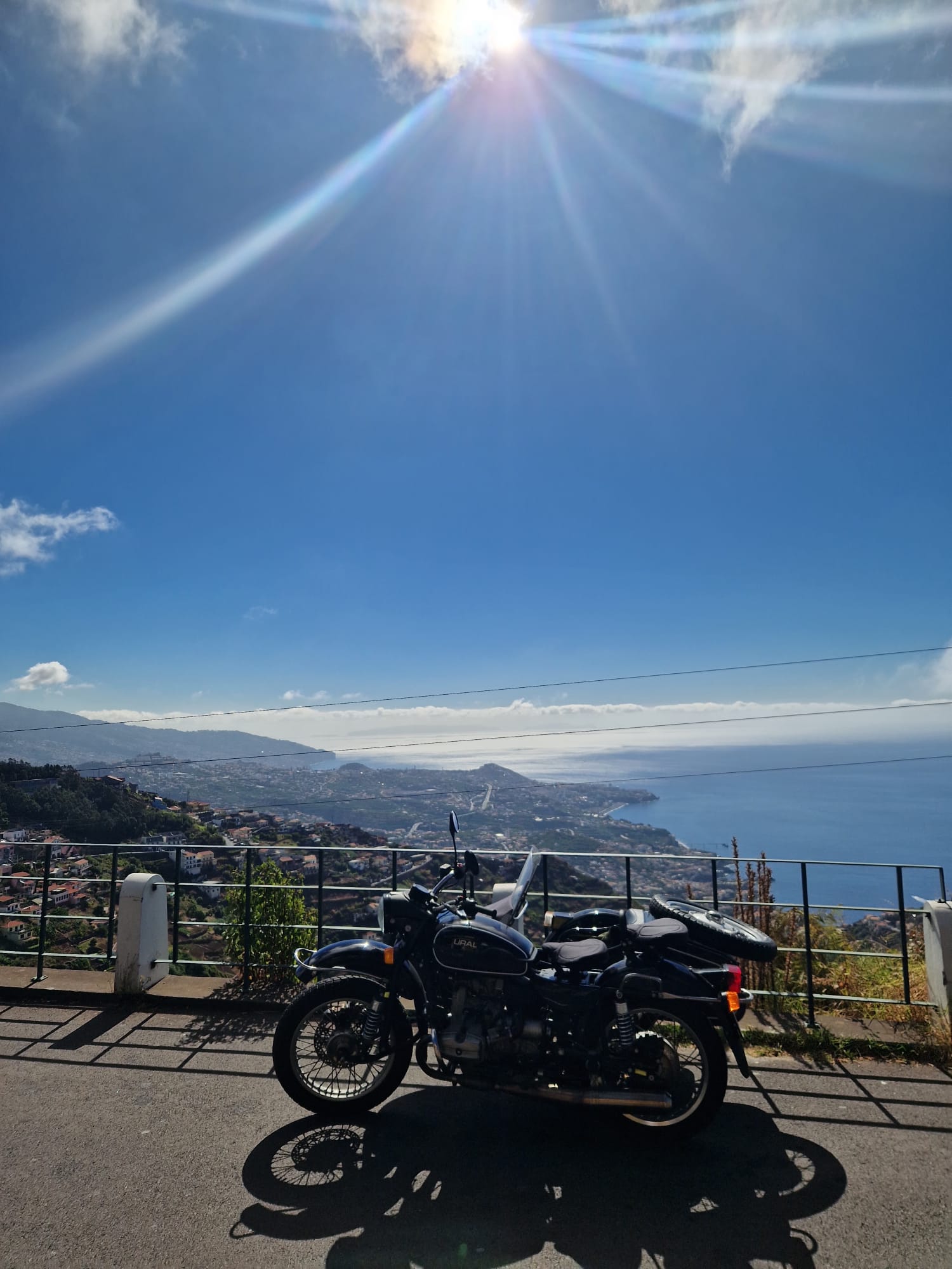 URAL motorbike with sidecar parked at a coastal lookout in Madeira